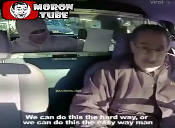 Video: This moron robs a cab driver, with a police car behind him